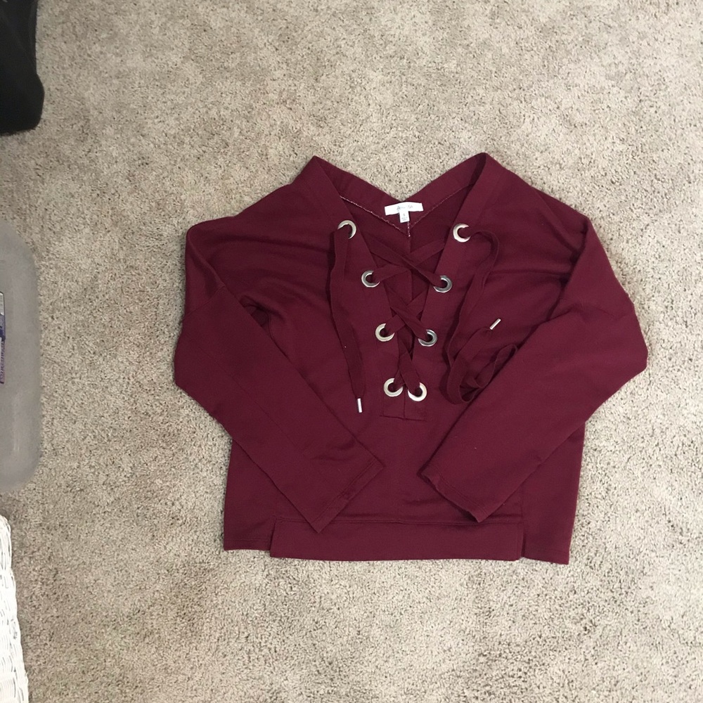Wide neck maroon sweatshirt with shoelace ties